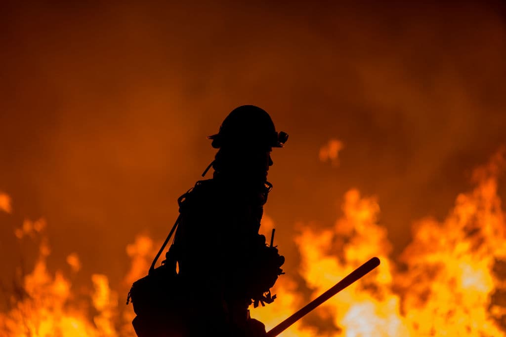 Over 14,000 firefighters and hundreds of army personnel are involved in the firefighting efforts across the state. (Getty Images)