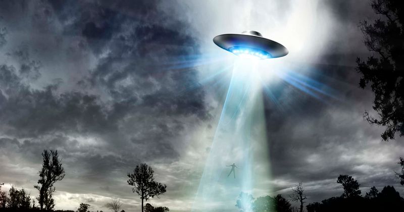 Alien hunters claim that UFOs are 'showing themselves' to help humanity 'reach a higher consciousness'