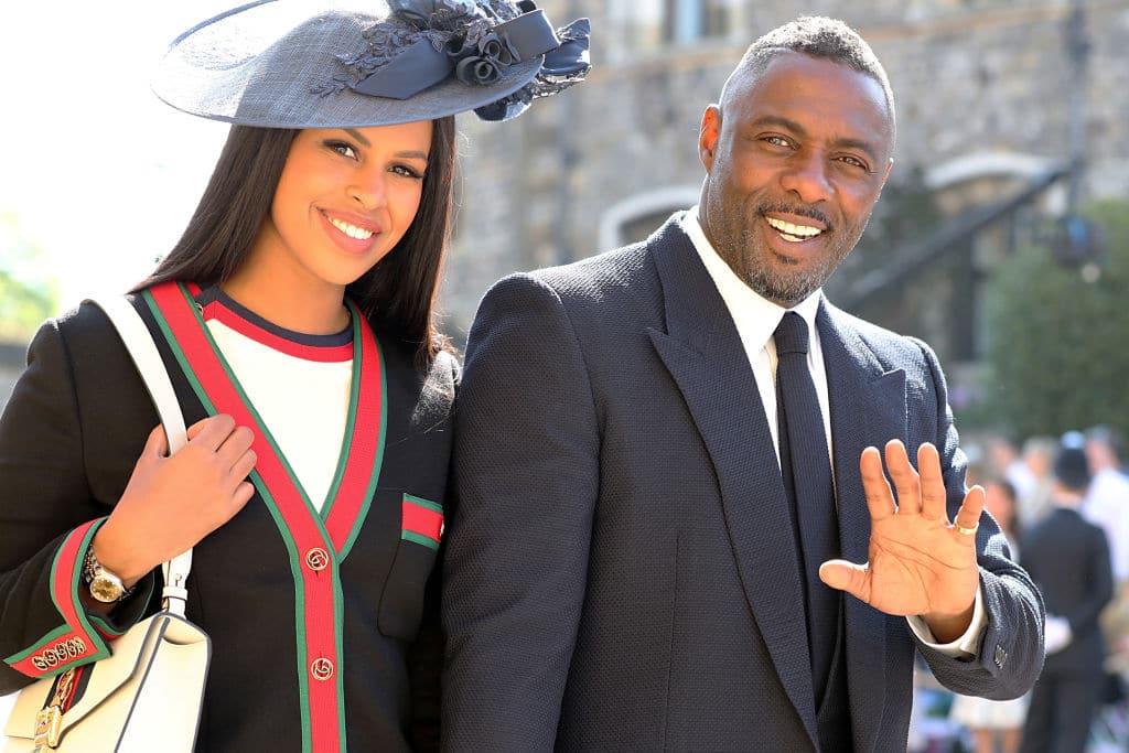 Idris Elba and Sabrina Dhowre arrive at St George's Chapel at Windsor Castle before the wedding of Prince Harry to Meghan Markle on May 19, 2018 in Windsor, England. (Photo by Gareth Fuller - WPA Pool/Getty Images)