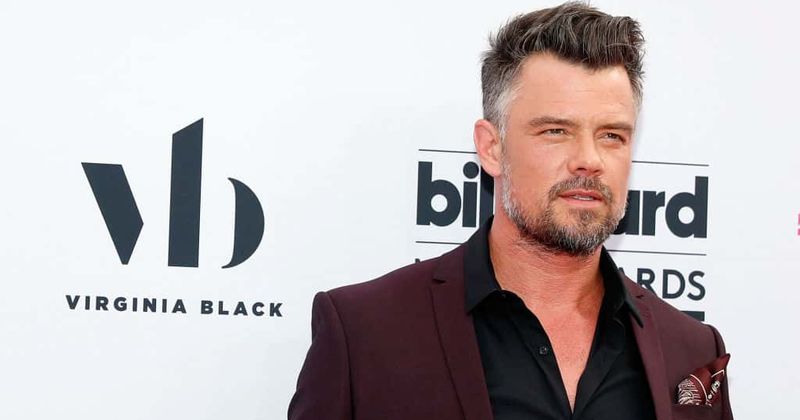 Josh Duhamel shows off washboard abs while on family vacation with son Axl