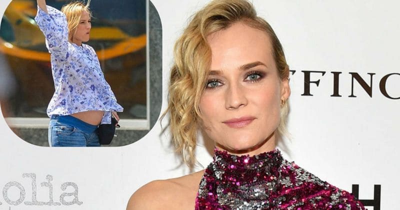 Diane Kruger accidentally reveals baby bump while hailing a cab in New York