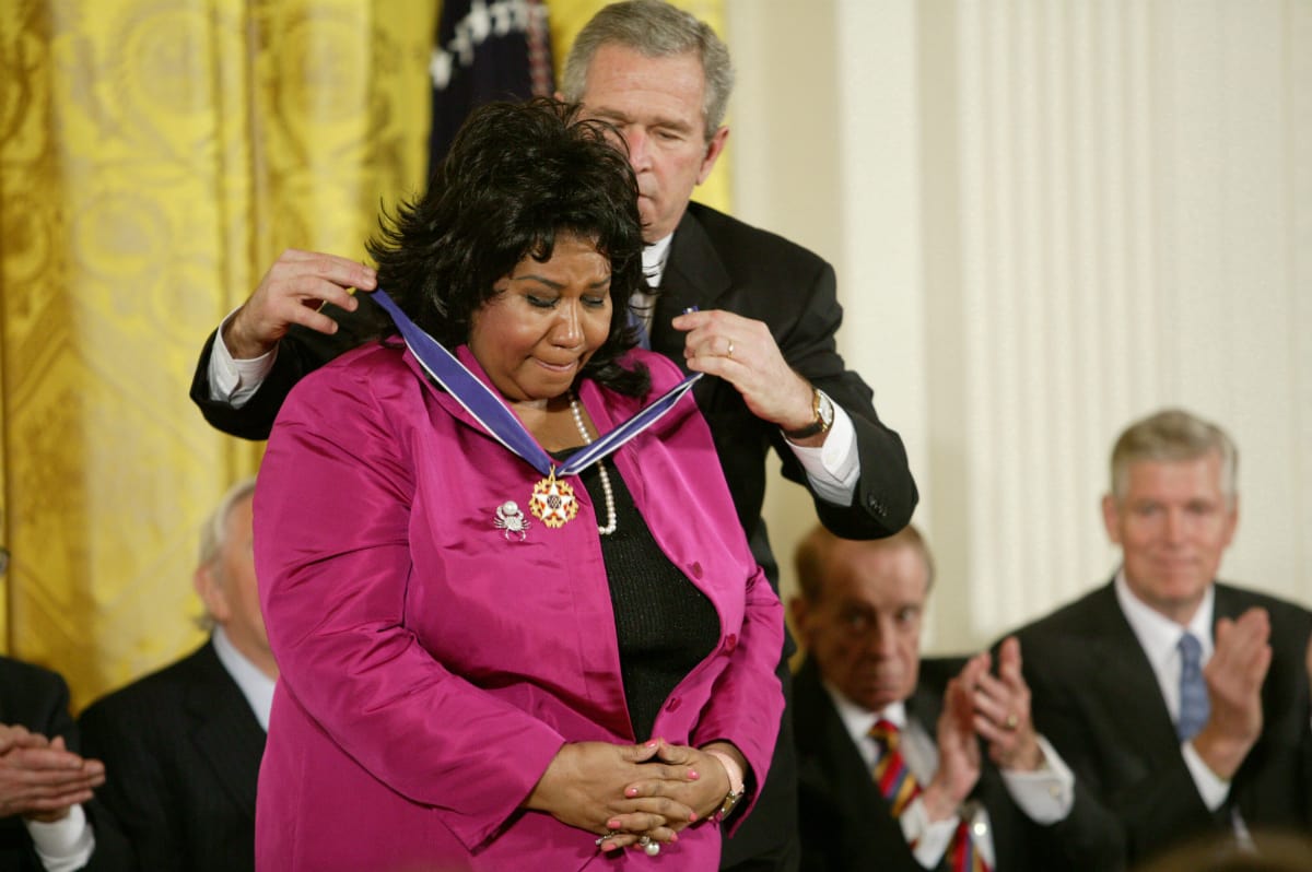 Aretha L. Franklin and President George W. Bush at the Freedom Awards Ceremony at the White House in Washington D.C. on November 9, 2005. (Photo by Douglas A. Sonders/Getty Images)