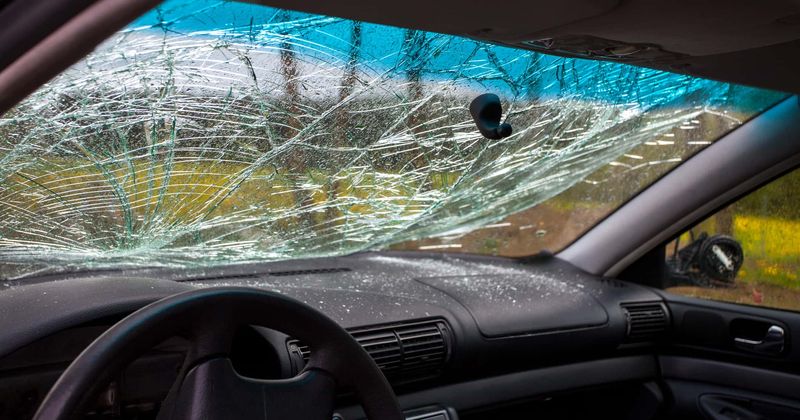 Woman drives home with corpse of man who landed in passenger seat after he smashed through windscreen in drunk-driving crash