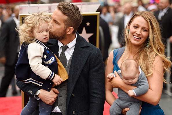 Actors Ryan Reynolds (L) and Blake Lively pose with their daughters as Ryan Reynolds is honored with star on the Hollywood Walk of Fame on December 15, 2016 in Hollywood, California. (Photo by Matt Winkelmeyer/Getty Images)