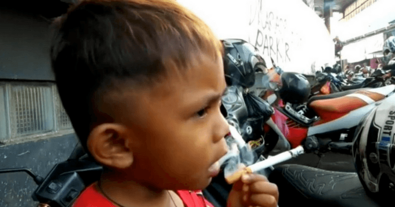 Smoking toddler with two-packs-a-day habit quits after being given year's supply of milk and biscuits