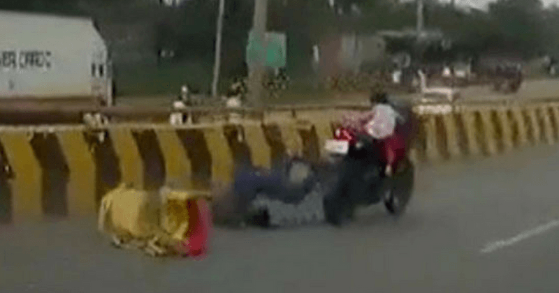 Footage of 5-year-old clinging to speeding motorbike after parents are thrown off will send chills down your spine