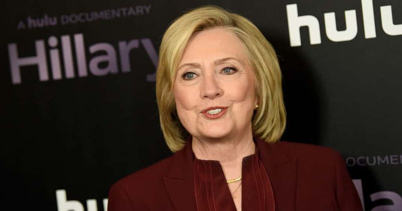 Hillary and Bill Clinton enjoy a loved-up weekend at friend's son's wedding