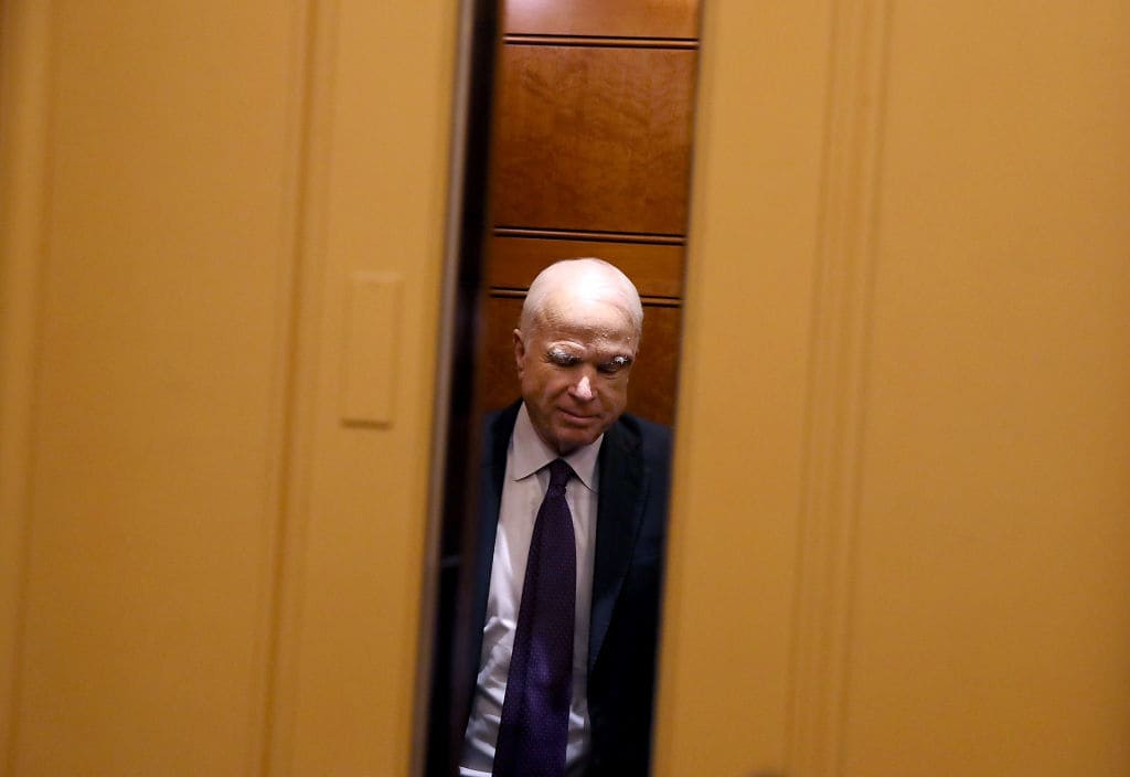 In an op-ed article in the Washington Post, John McCain called the president "impulsive" and "often poorly informed." (Getty Images)