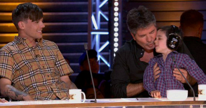 Simon Cowell's four-year-old son steals the show after making a surprise appearance on 'X Factor'