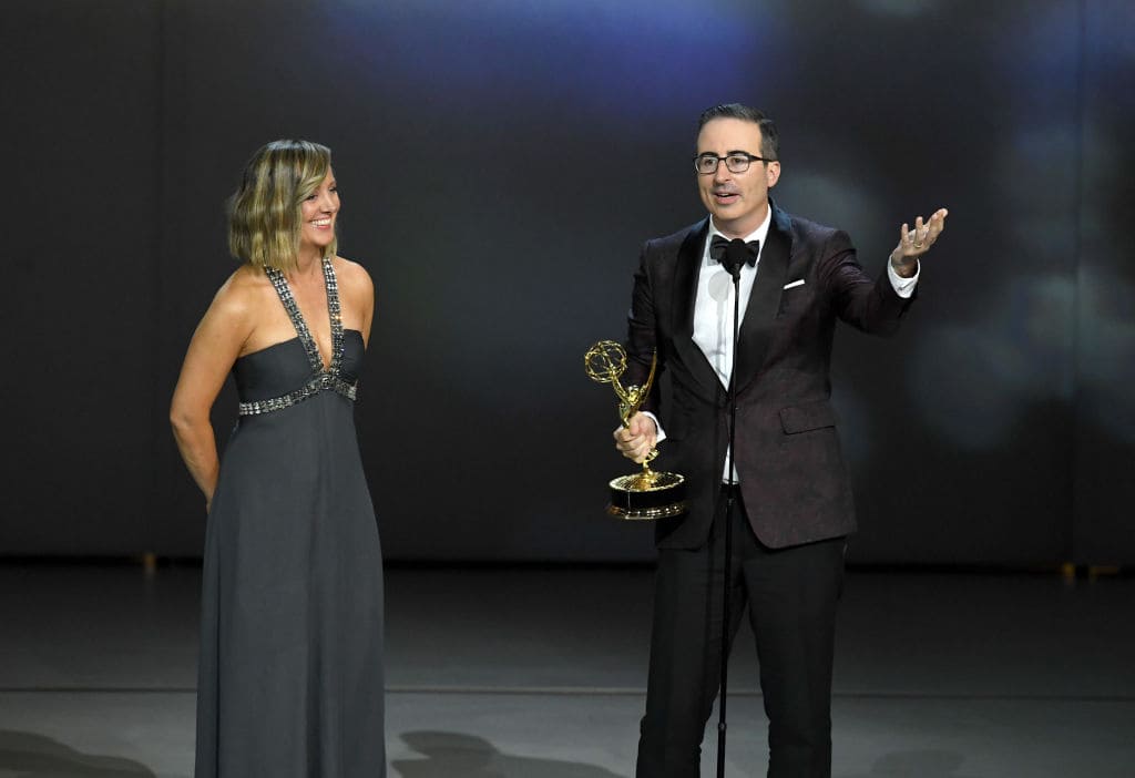 Liz Stanton (L) and John Oliver accept the Outstanding Variety Talk Series award for 'Last Week Tonight with John Oliver' onstage during the 70th Emmy Awards at Microsoft Theater on September 17, 2018 in Los Angeles, California. (Photo by Kevin Winter/Getty Images)
