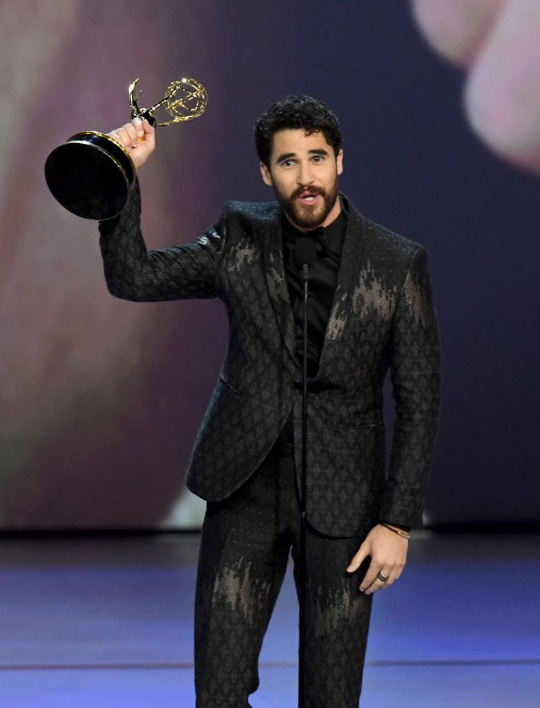 Darren Criss accepts the Outstanding Lead Actor in a Limited Series or Movie award for 'The Assassination of Gianni Versace: American Crime Story' onstage during the 70th Emmy Awards at Microsoft Theater on September 17, 2018 in Los Angeles, California. (Photo by Kevin Winter/Getty Images)