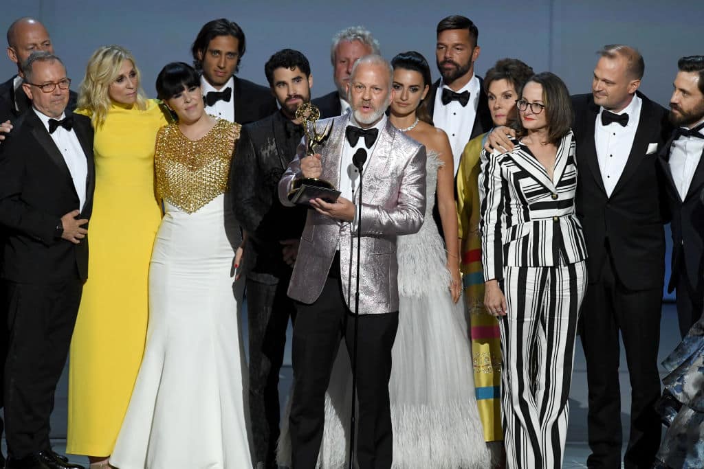 yan Murphy (C) and cast and crew accepts the Outstanding Limited Series award for 'The Assassination of Gianni Versace: American Crime Story' onstage during the 70th Emmy Awards at Microsoft Theater on September 17, 2018 in Los Angeles, California. (Photo by Kevin Winter/Getty Images)