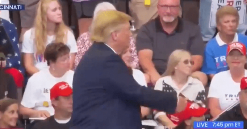 Trump appears to make obscene gesture as protester is thrown out of Cincinnati rally: 'Remind him that kids are watching'