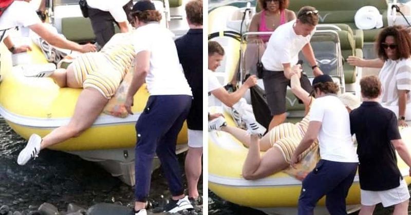 Katy Perry gets a helping hand from Bradley Cooper after getting stuck on dinghy while holidaying with Oprah
