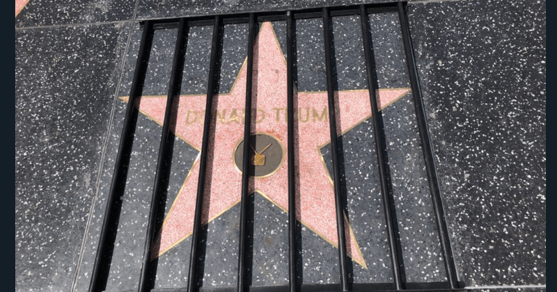 Artist puts Trump's star on the Hollywood Walk of Fame behind bars
