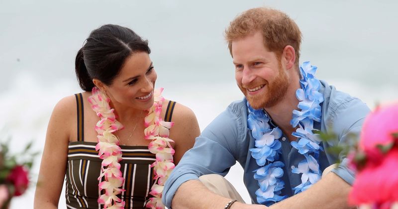 Friends have reportedly stopped inviting Meghan Markle and Harry to dinner parties as they frown upon their PDA: 'She insists on sitting next to him'
