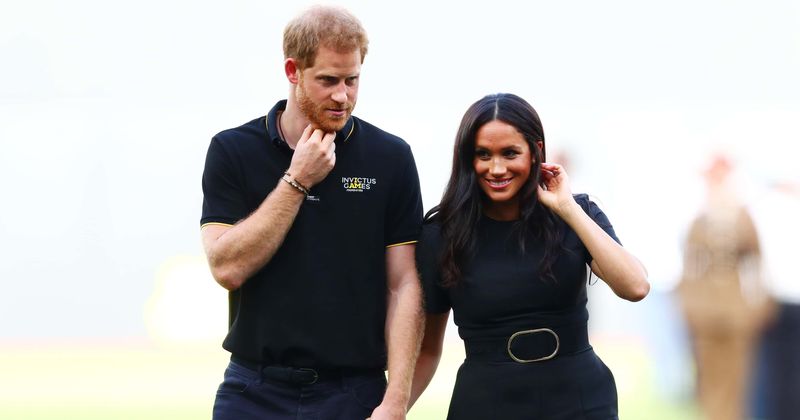 Watch out Harry! Meghan Markle stuns in stilettos as she challenges her husband for a game of netball
