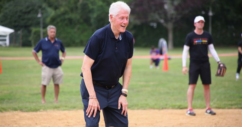 Bill Clinton umpires celebrity softball game days after Trump claimed he visited Epstein's 'Pedophile Island'