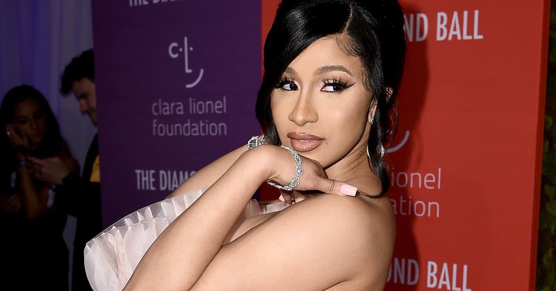 Cardi B shows off her incredible curves in purple thong suit while dancing to her new track
