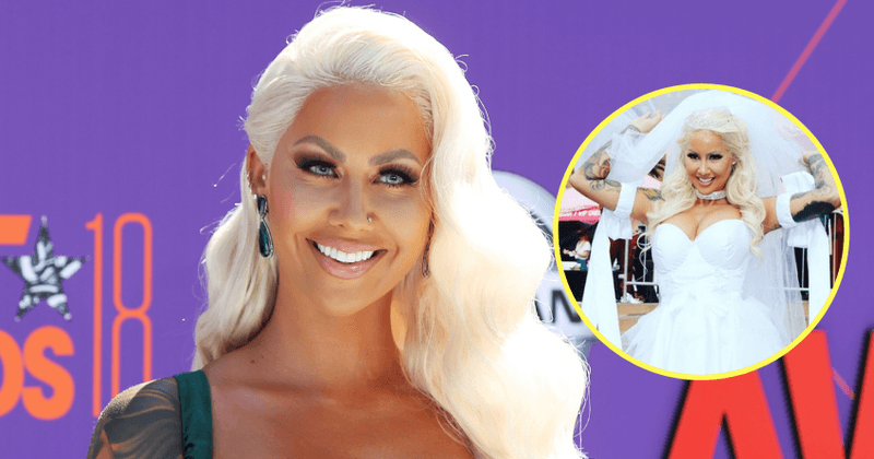 Amber Rose stuns as she dresses up as a bride in suspenders for SlutWalk 2018