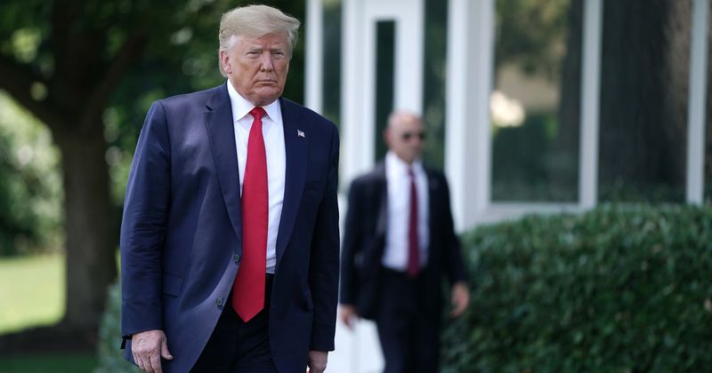 Trump was labelled 'the last hope for white people' by former police chief on trial for hate crime