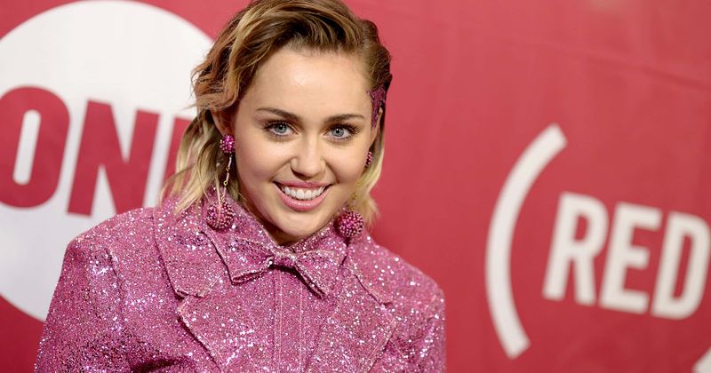 Miley Cyrus shares adorable selfie with shirtless 'boyfriend' Cody Simpson after getting released from hospital