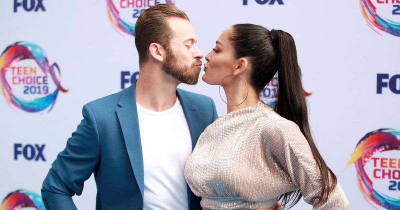 Nikki Bella dishes on 'amazing sex life' with Artem Chigvintsev: 'He just moves those hips and he’ll even do it naked!'