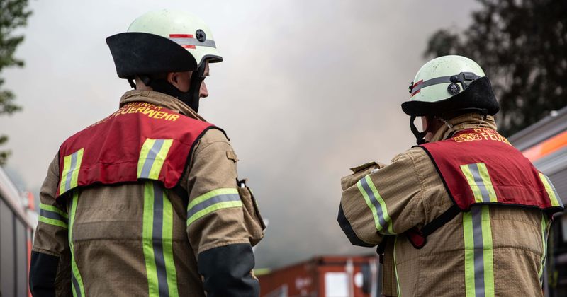 'Hero' firefighter saves woman by performing CPR for 30 minutes after she suffered a cardiac arrest mid-flight