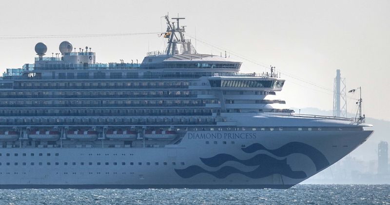 Woman who climbed over balcony railing to take selfies on edge of Royal Caribbean cruise ship gets booted off: 'What an absolute IDIOT'