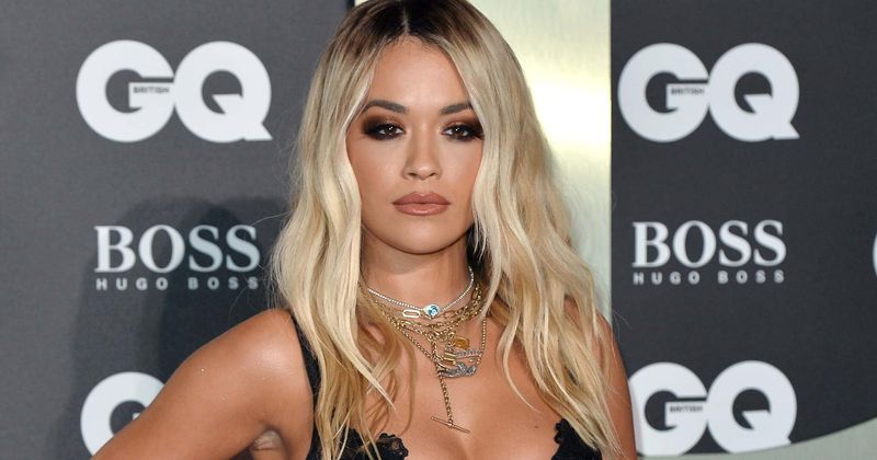 Rita Ora suffers wardrobe malfunction as she flashes her underwear in high-slit red gown at London event