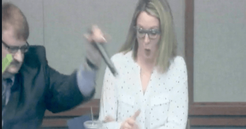 Republican lawmaker snatches mic from Democratic candidate during debate, tosses it towards her later