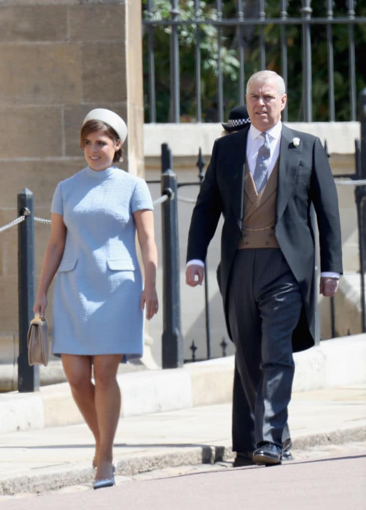 Princess Eugenie and with Prince Andrew at the wedding of Prince Harry and Meghan Markle at St George's Chapel, Windsor Castle on May 19, 2018 in Windsor (Photo by Chris Jackson/Getty Images)