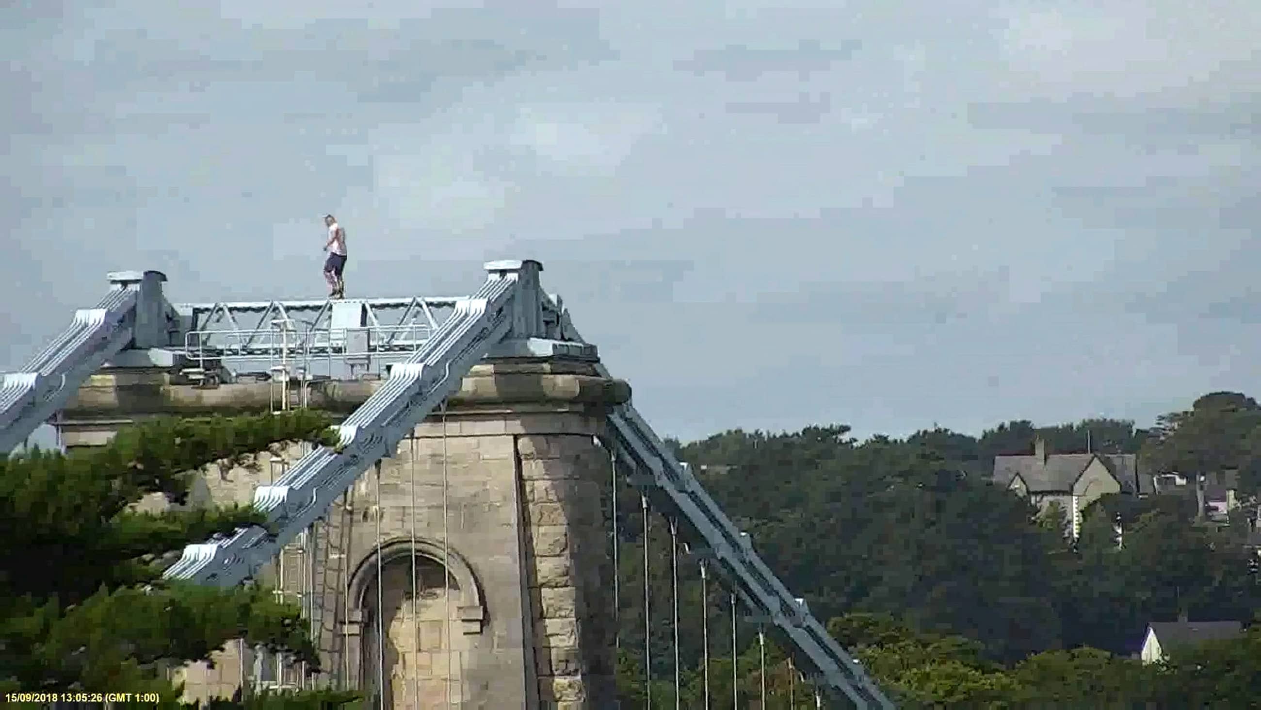 The man remained at the top of the bridge for an hour (SWNS)