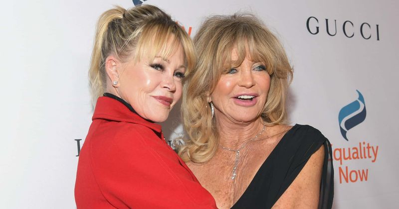 Melanie Griffith and Goldie Hawn spell casual elegance as they enjoy a fun night out at Sting's concert