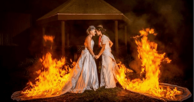 Lit Wedding: Daredevil brides set their beautiful dresses on fire in dramatic stunt during wedding ceremony