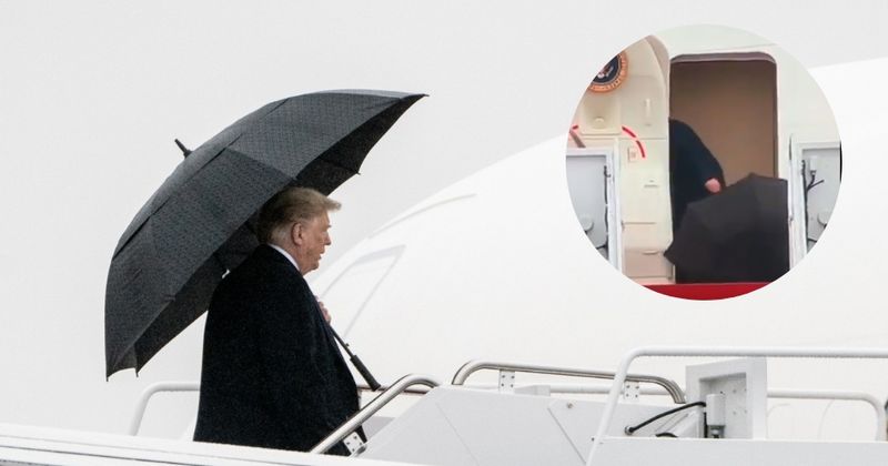 Trump fails to close his umbrella, dumps it at the door of Air Force One for Secret Service agent to pick it up