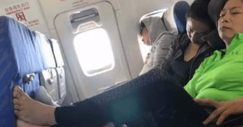 Flight passengers left disgusted after two women place feet on tray table and refuse to take them down