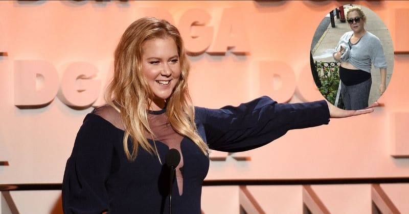 Amy Schumer proudly shows off her baby bump for the first time after announcing her pregnancy