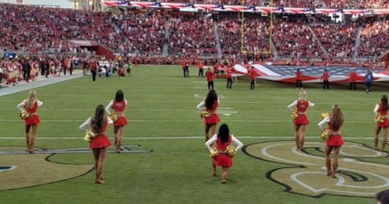 49ers cheerleader takes a knee during national anthem after NFL bans players from kneeling on field