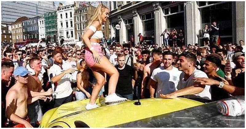 Waitress who wrecked ambulance by dancing on top of it after England's World Cup win charged with criminal damage