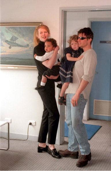 Actors Nicole Kidman and husband Tom Cruise arrive at Sydney Kingsford Smith airport and introduce their children Connor and Isabella to the media on January 24, 1996, in Sydney, Australia. (Getty Images)