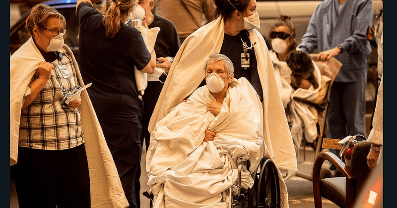 Nurses risk their lives to save elderly patients and newborns from burning hospital after it was seized by California wildfires