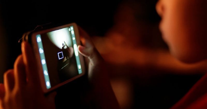 Woman strangles seven-year-old daughter to death because she was spending 'too much time on the phone'