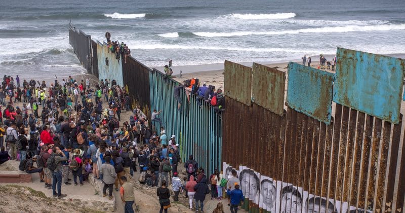 Migrant caravan holds mass LGBTQ wedding at Mexican border in celebration of their new life in America