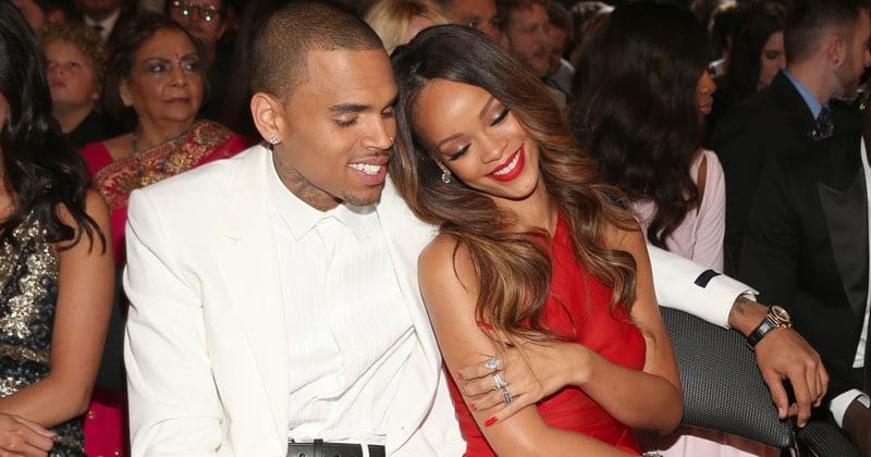 Fans hit out at Chris Brown after he reacts to Rihanna's racy pictures with wide-eyed emojis