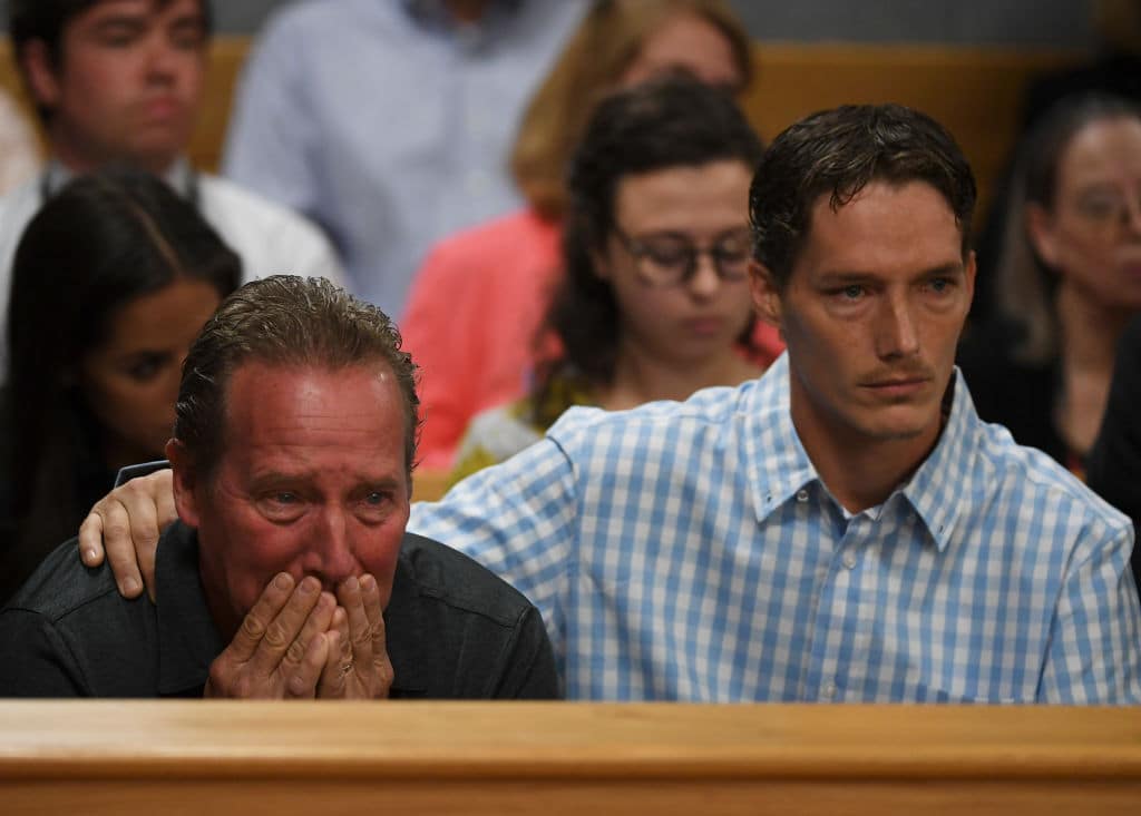 Shanann Watts' father Frank Rzucek (left) and brother Frankie Rzucek break down at the Weld County Courthouse on August 21, 2018 in Greeley, Colorado. (Photo by RJ Sangosti - Pool/Getty Images)