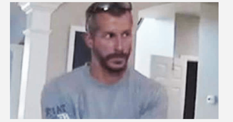 Chris Watts stares down at Shannan's friend after she filed a missing persons report and got police home
