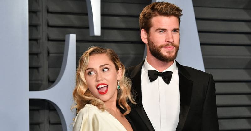 Miley Cyrus and Liam Hemsworth waste no time in making up for 3 years apart as they cozy up on SNL