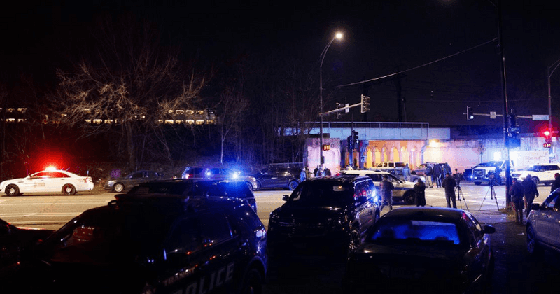 Two Chicago cops killed in 'devastating tragedy' after they get hit by train while chasing armed suspect on tracks