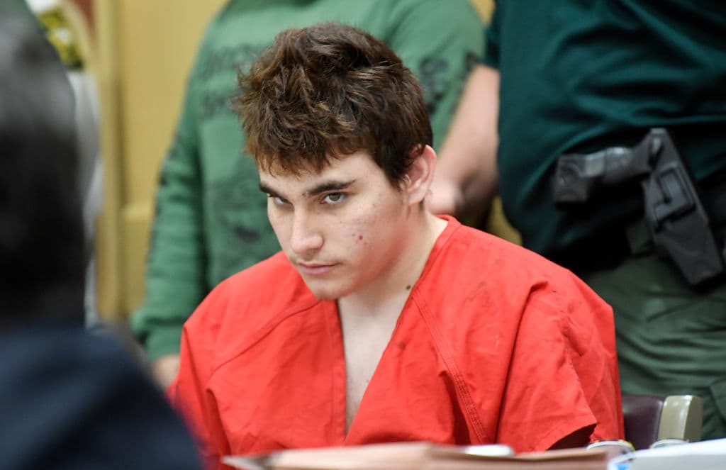 Florida school shooting suspect Nikolas Cruz quickly glances up at the prosecutors during a hearing on April 27, 2018, in Fort Lauderdale, Florida. (Photo by Taimy Alvarez-Pool/Getty Images)